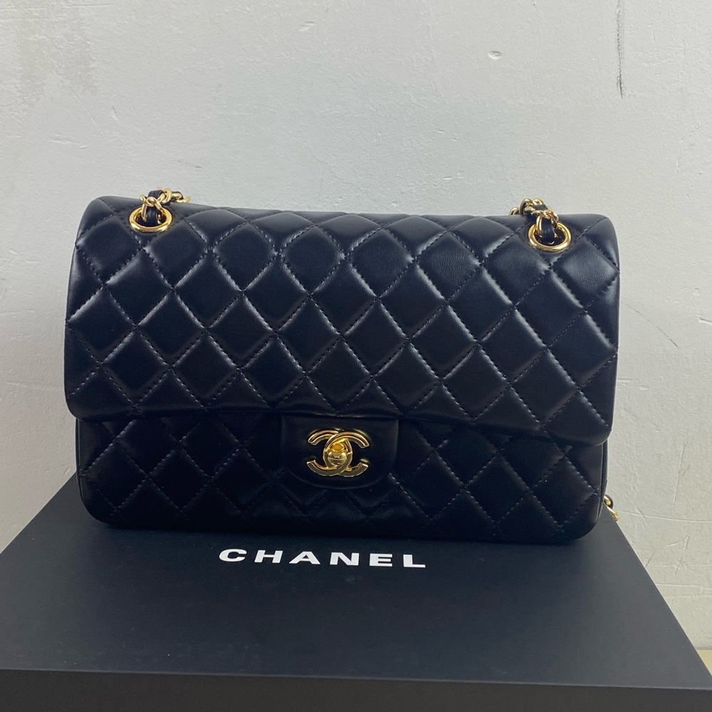 CHANEL Quilted Black Leather Shoulder Bag with Gold Hardware